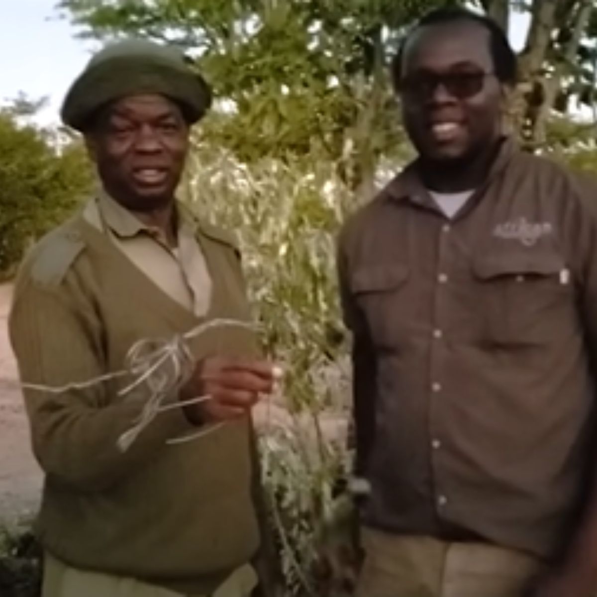 rescuers pose with the wire