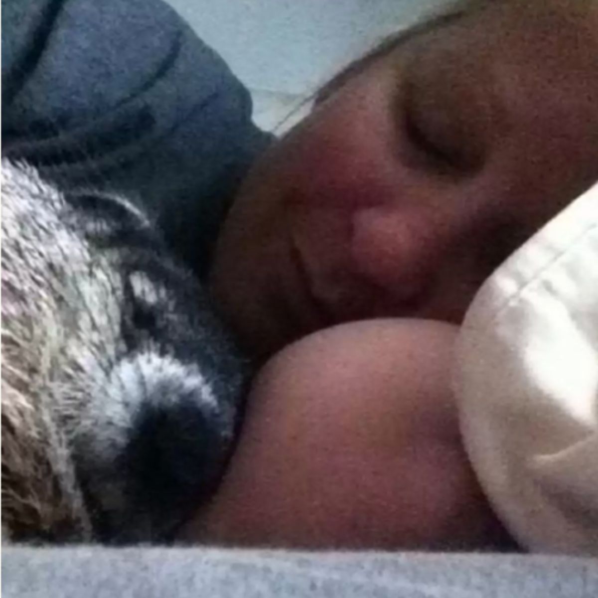 woman sleeping next to woodchuck