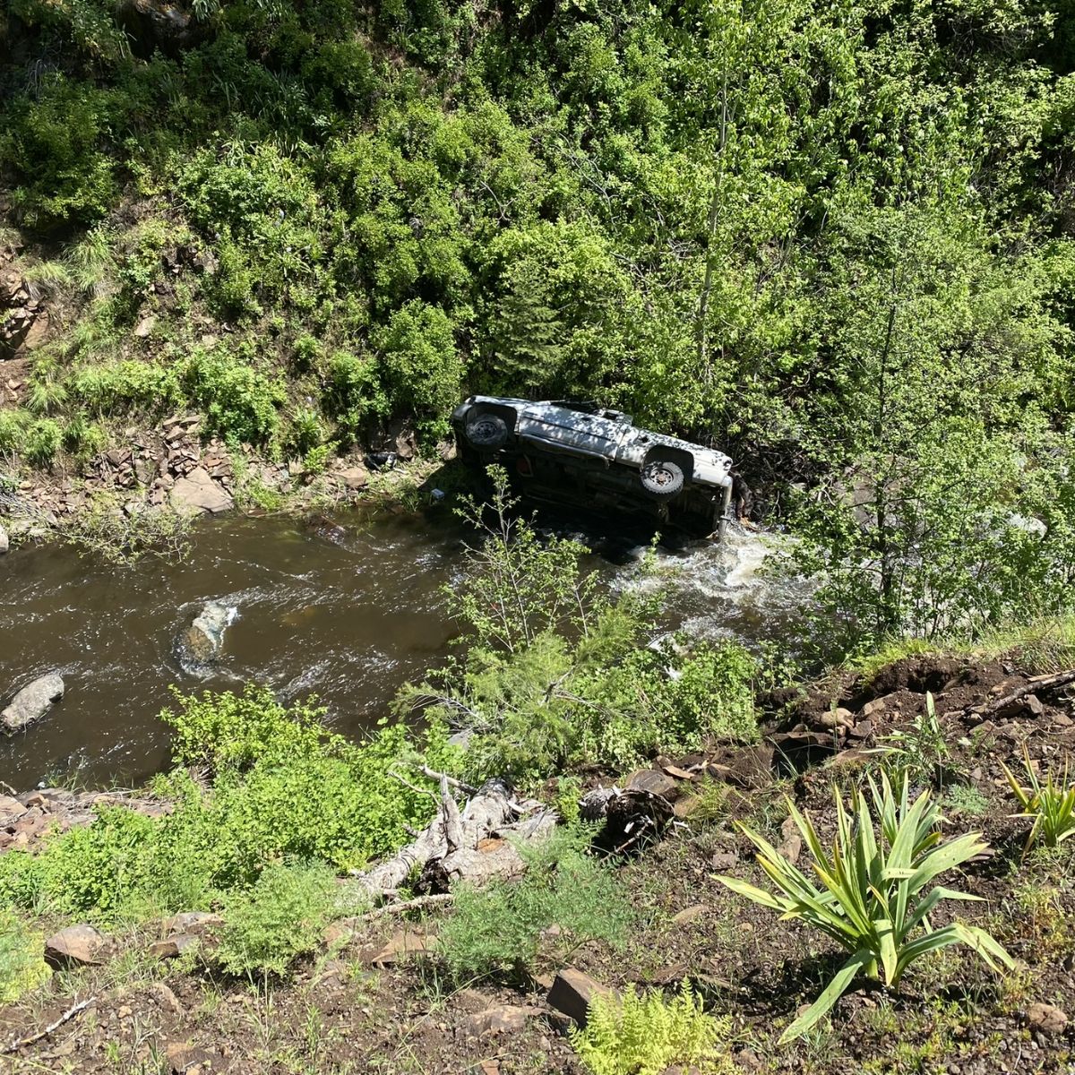 a car crushed in the water