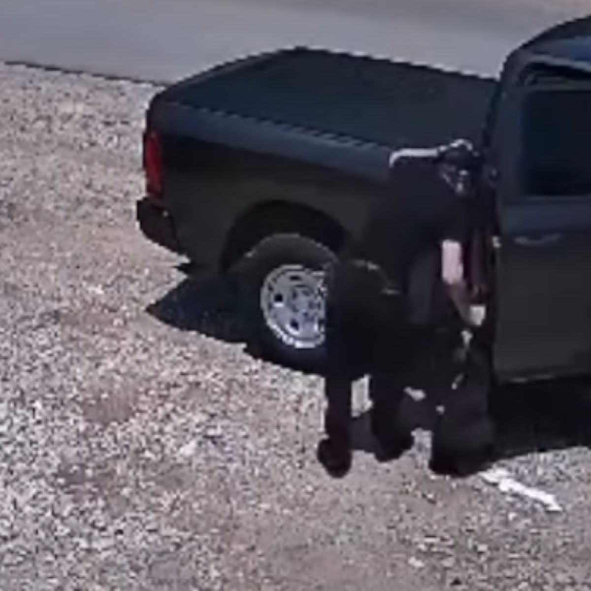 a man standing by the truck