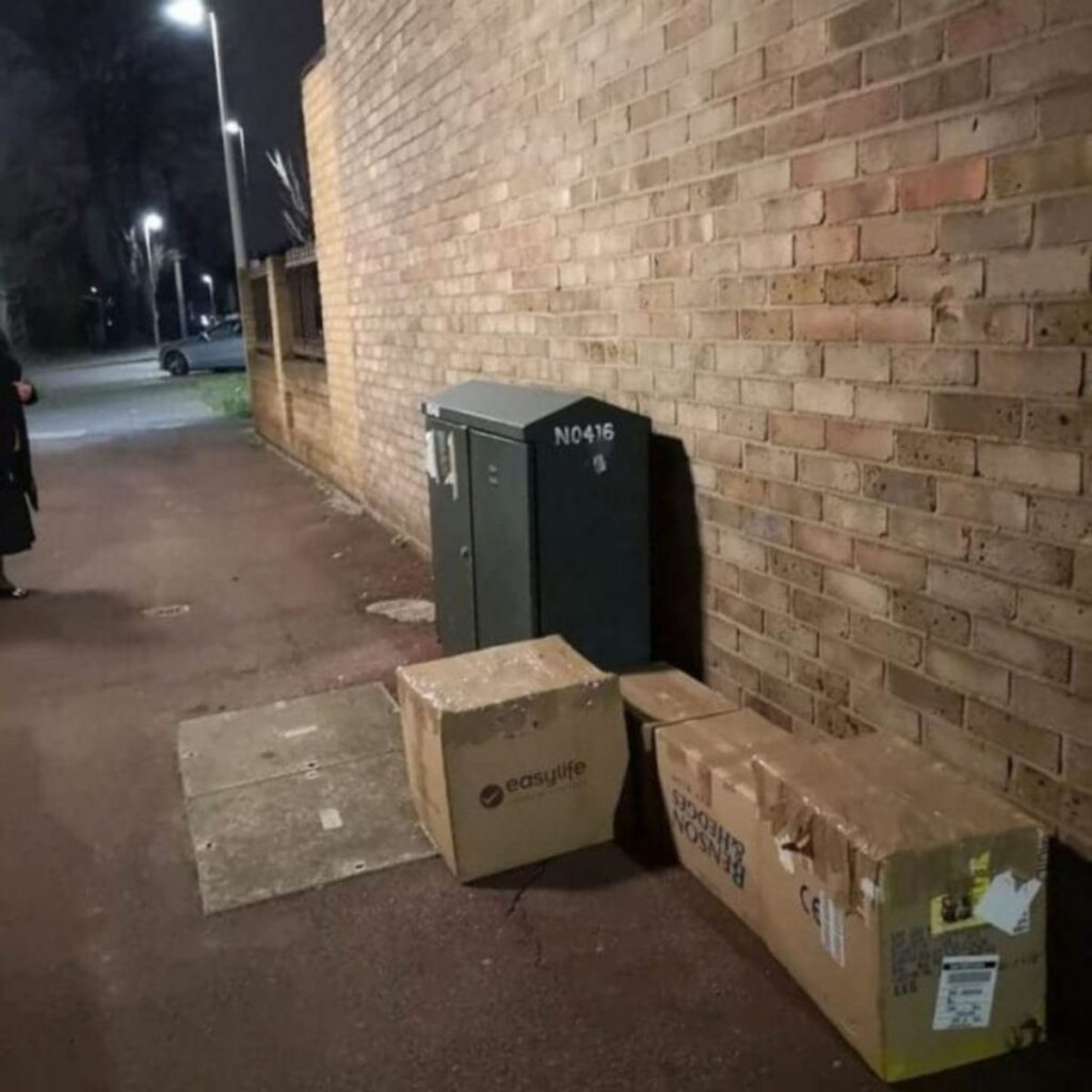 boxes next to the trash