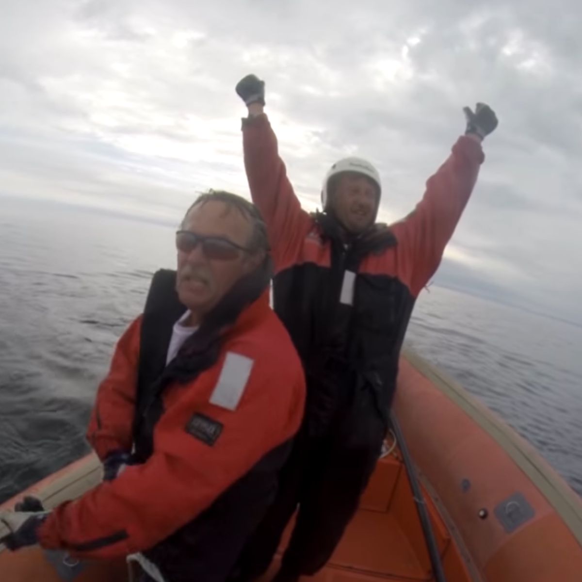 happy men on boat