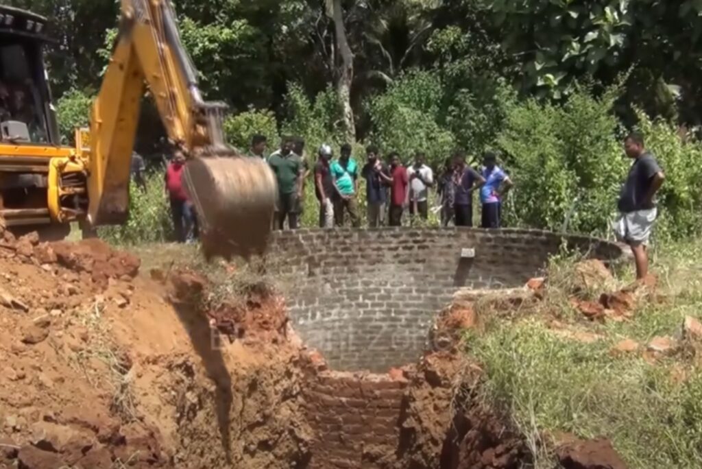 people next to the dug well