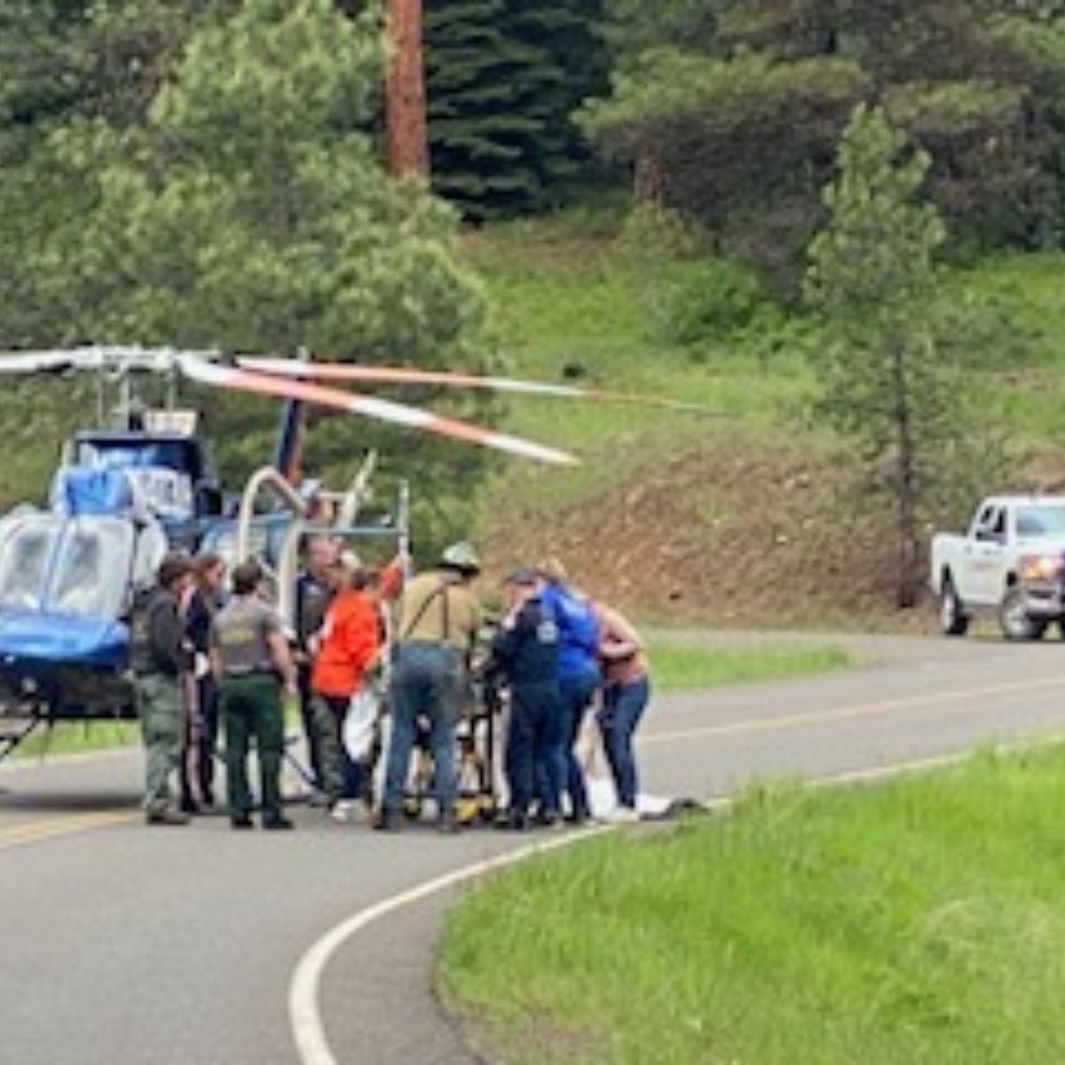 rescuers and helicopter