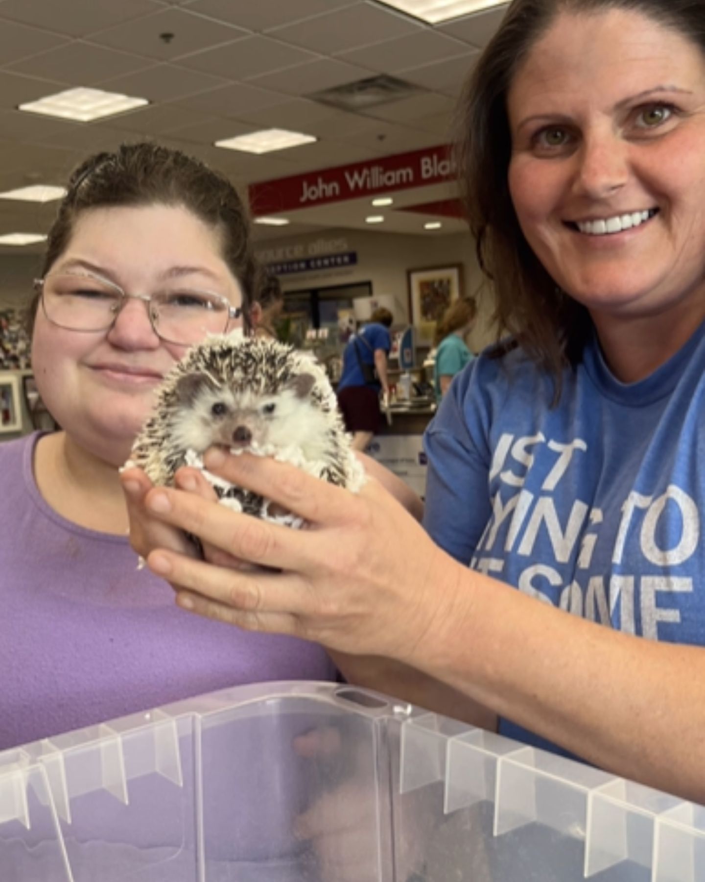 two women and hedgehog