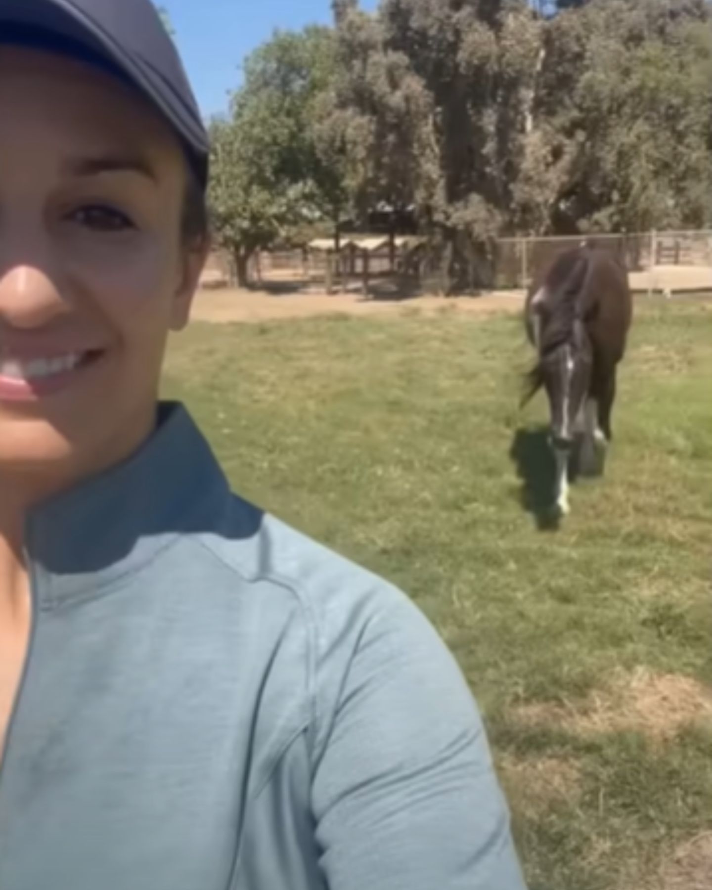 woman taking a selfie with horse