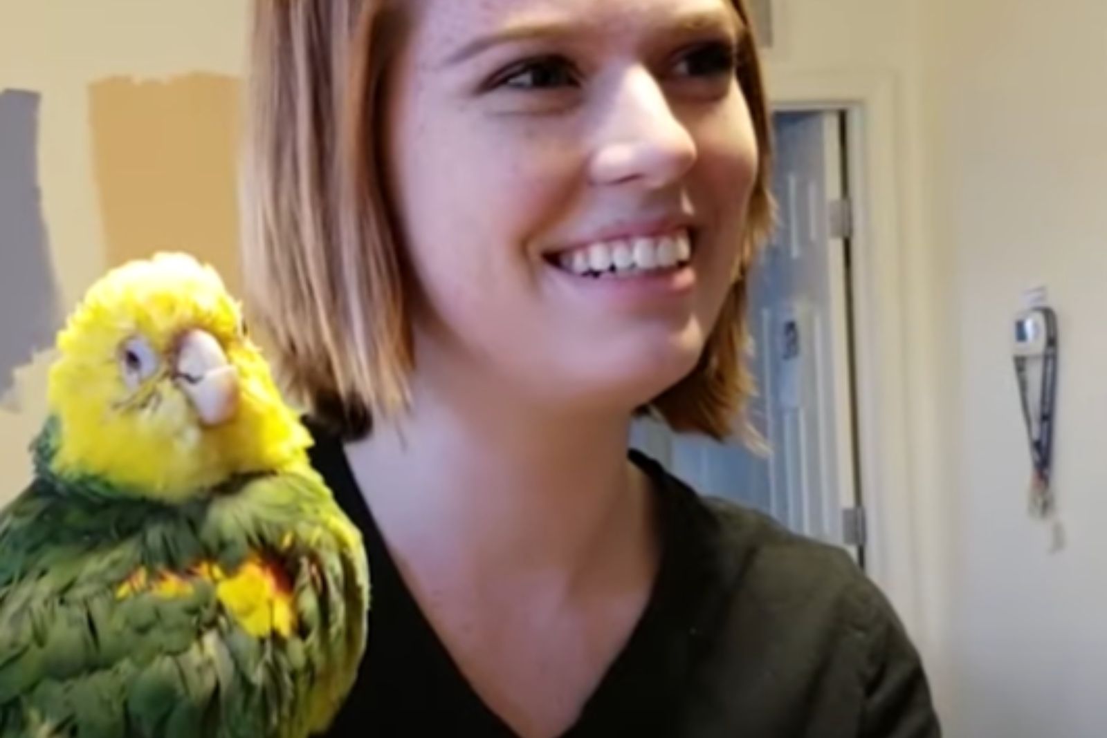 woman and a parrot