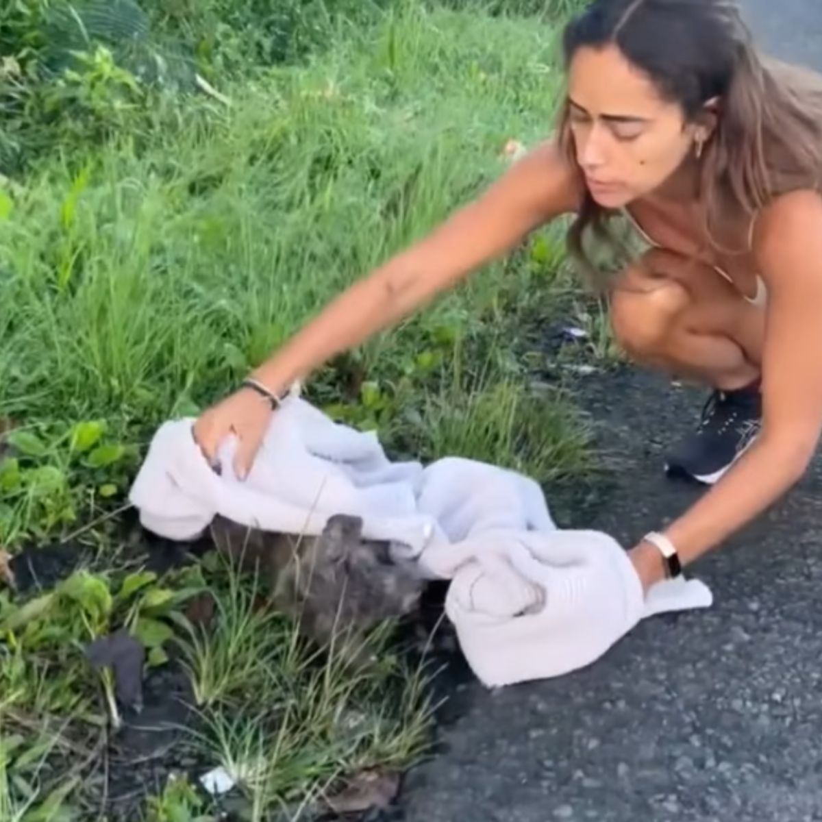 woman and injured puppy