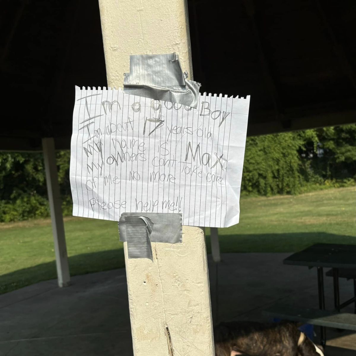 a note duct-taped on the outdoor wall