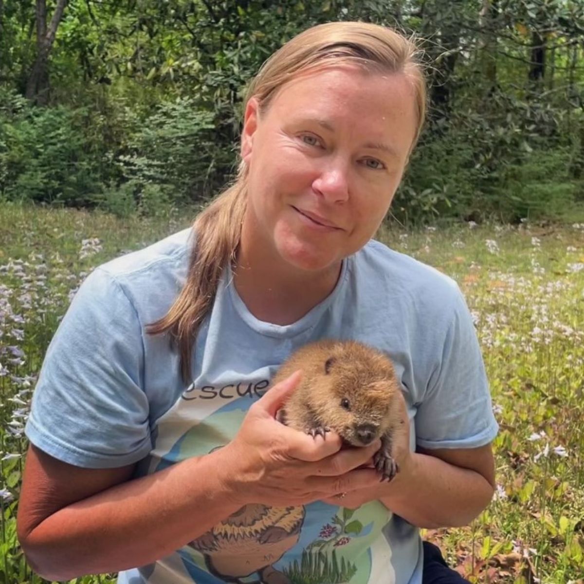 woman and beaver