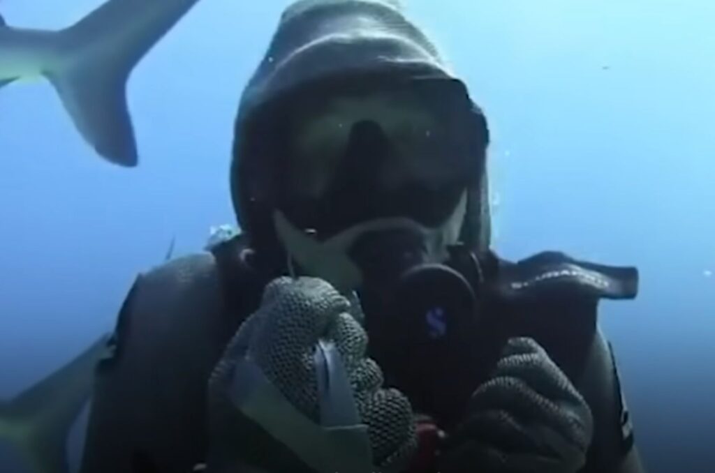 woman with equipment underwater