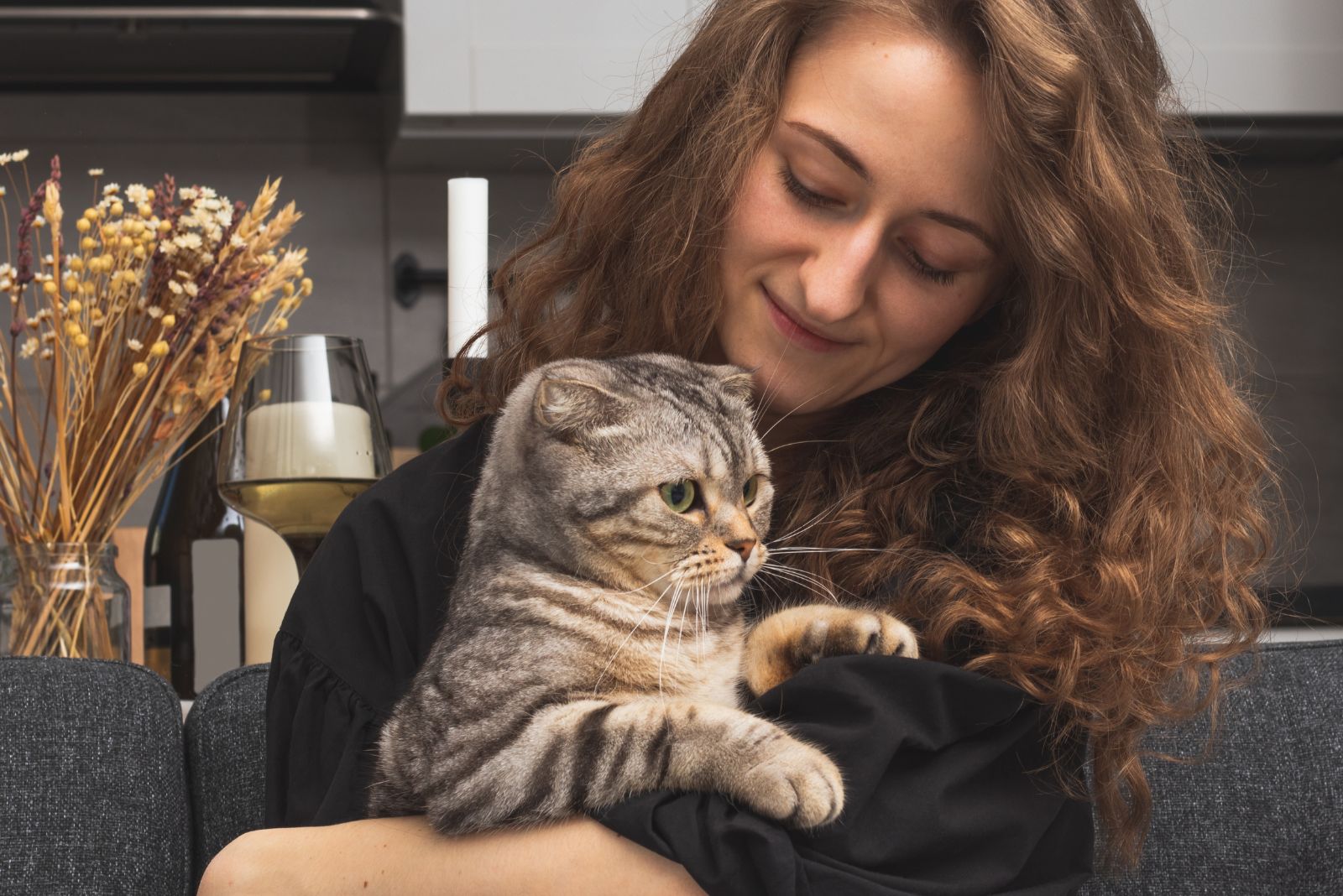 woman holding scottish fold