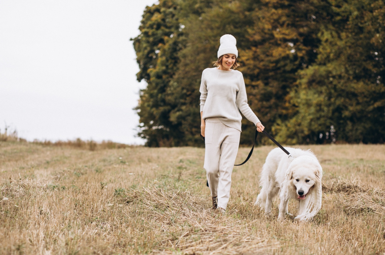 Woman and white dog