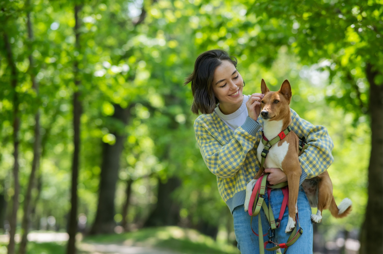 Woman holding a dog