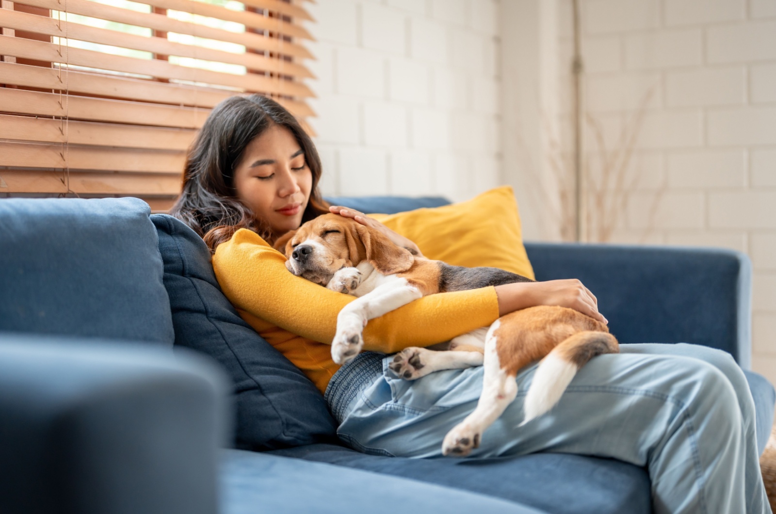 Woman holding a puppy