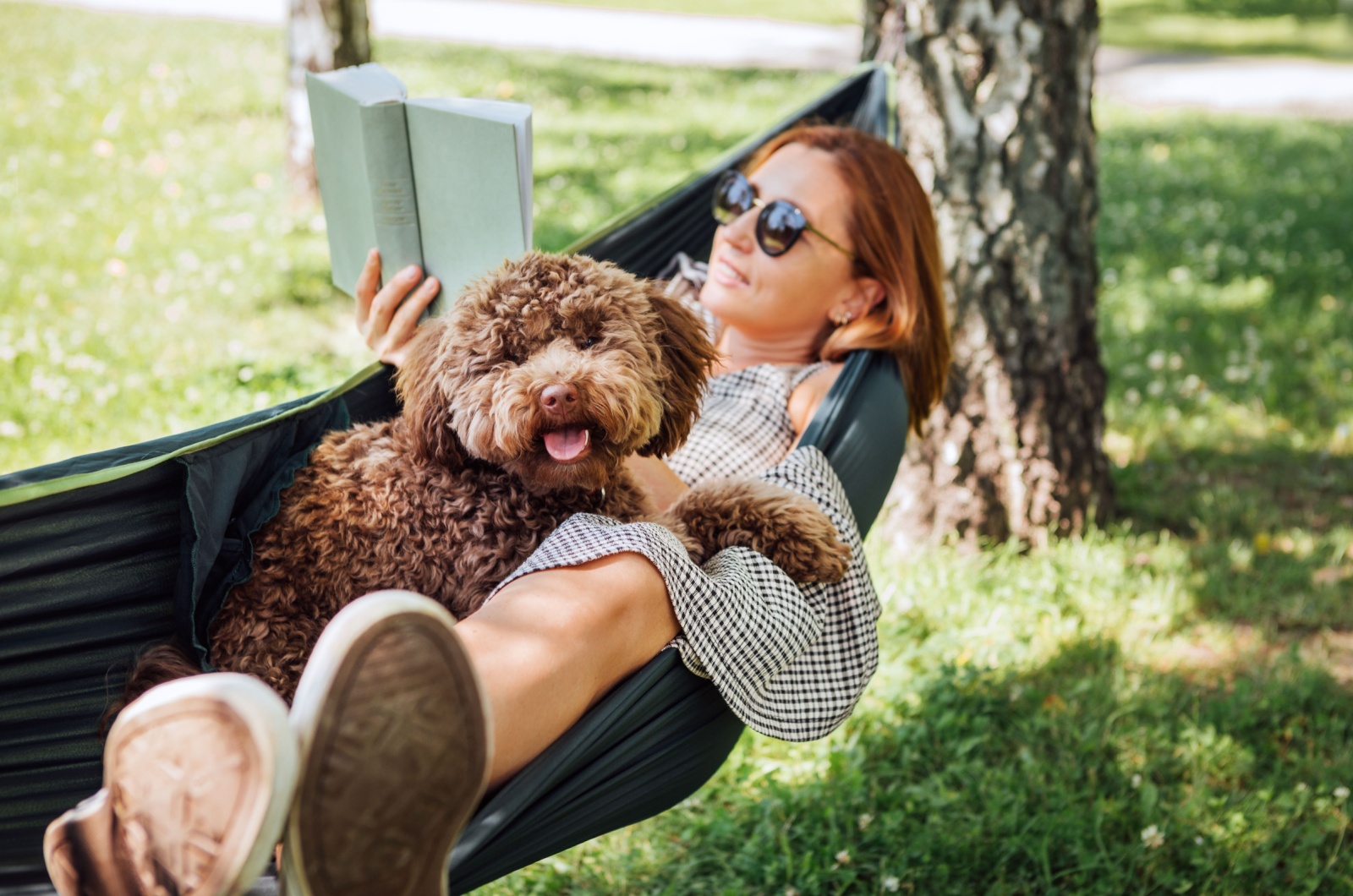 woman relaxing with dog