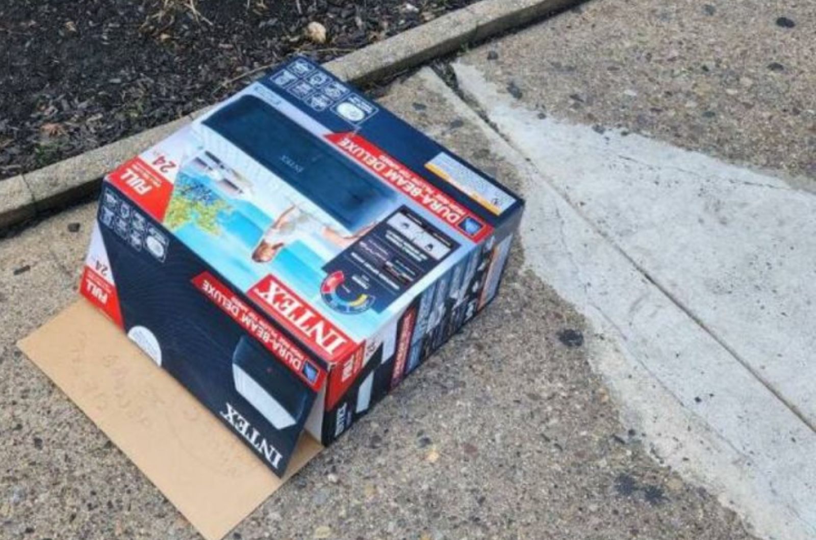 cardboard box left on a street