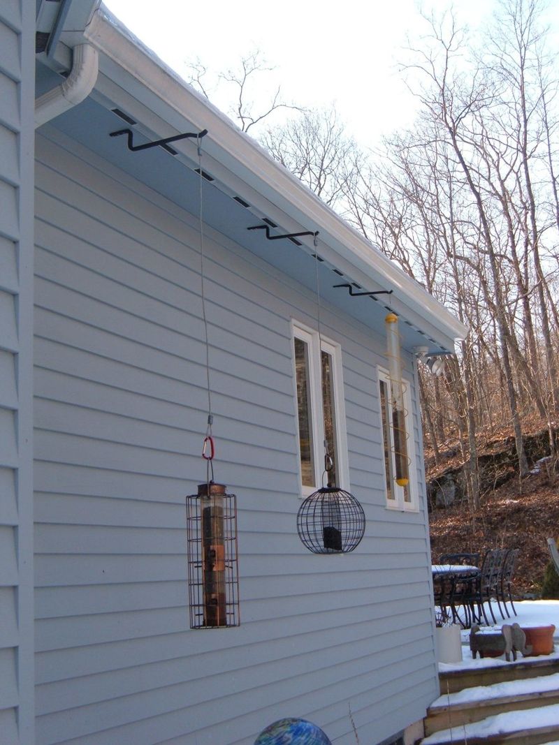 Under Overhanging Roofs Or Eaves