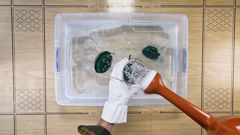Scrub Away Debris With Warm Soapy Water